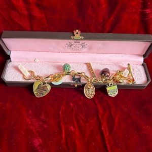 Juicy Couture Charm Bracelet with several charms
